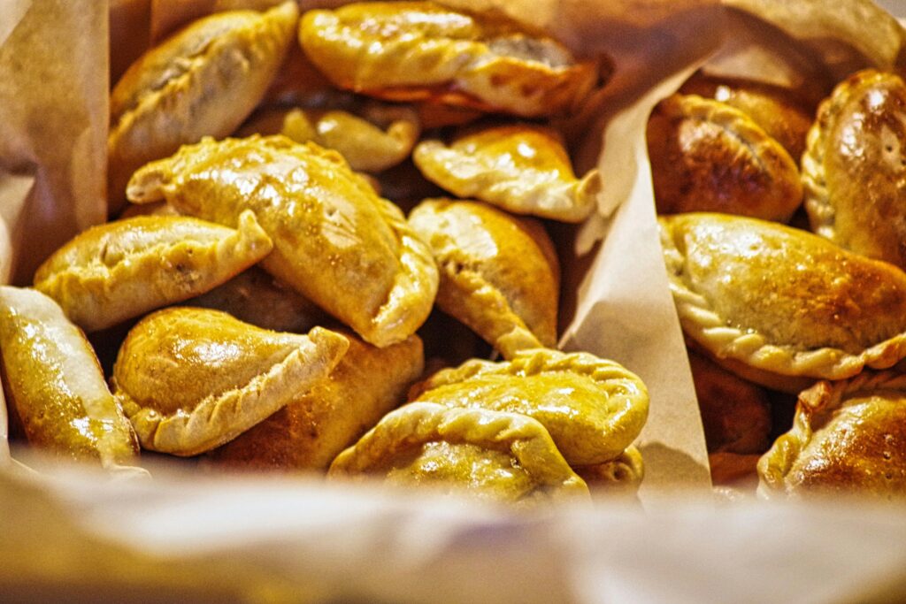 Delicious assortment of golden-brown baked pastries, perfect for a tasty treat.